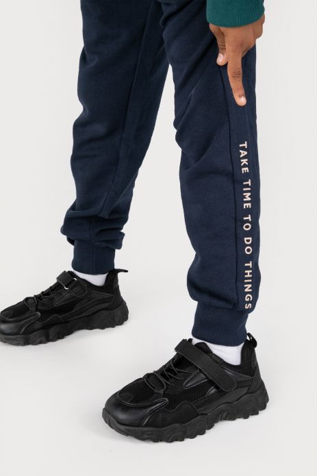 Sweatpants navy blue with pockets and other material inserts in regular cut  2