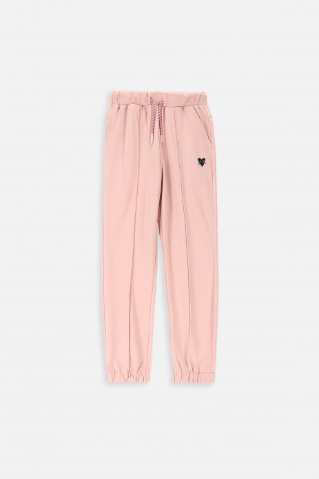 Sweatpants in the color of powder pink with a heart-cat