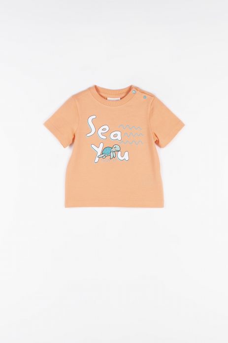 T-shirt orange, with a colorful print